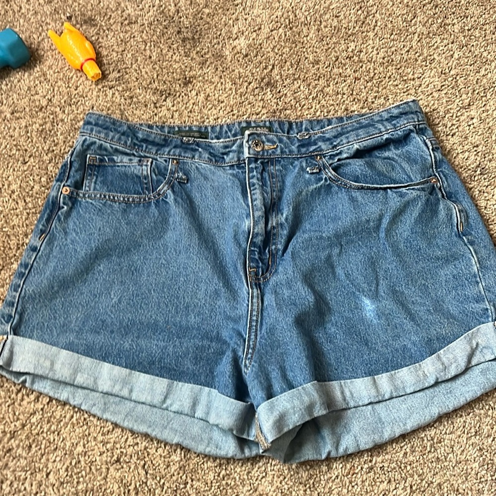 Blue shorts that say happy in the back